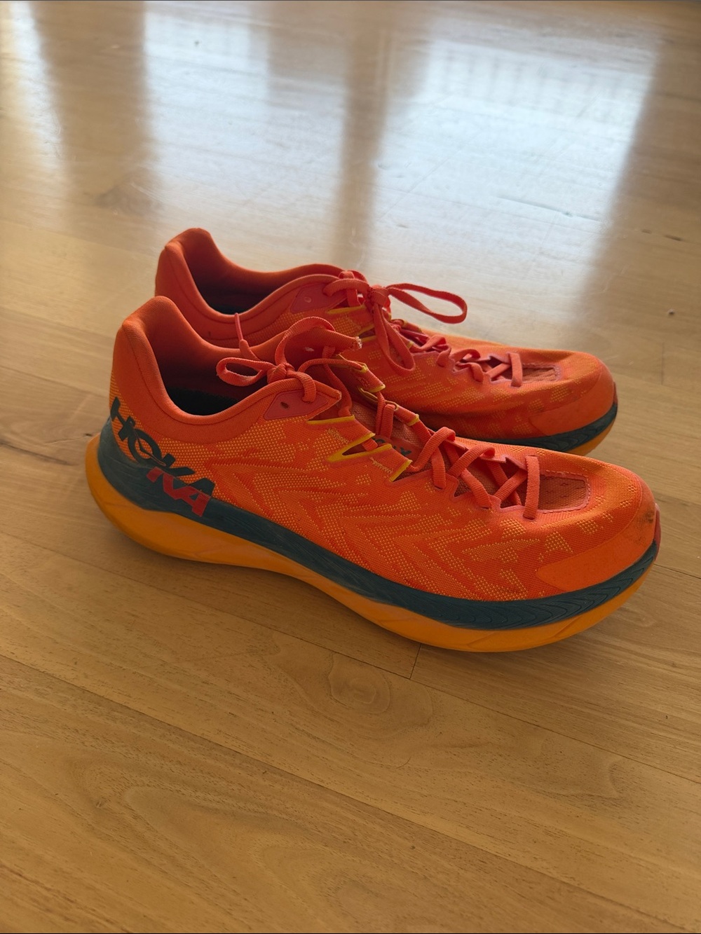 Hoka Men's Running Shoes in Bright Orange with Blue Accent